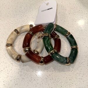 Fashion Nova Gold-Trimmed Cream, Red, and Green Bracelet Trio